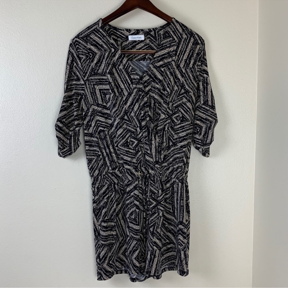 Calvin Klein Womens Romper Sz
8 Black Tan Surplice 3/4 Sleeve
Drawstring V-Neck